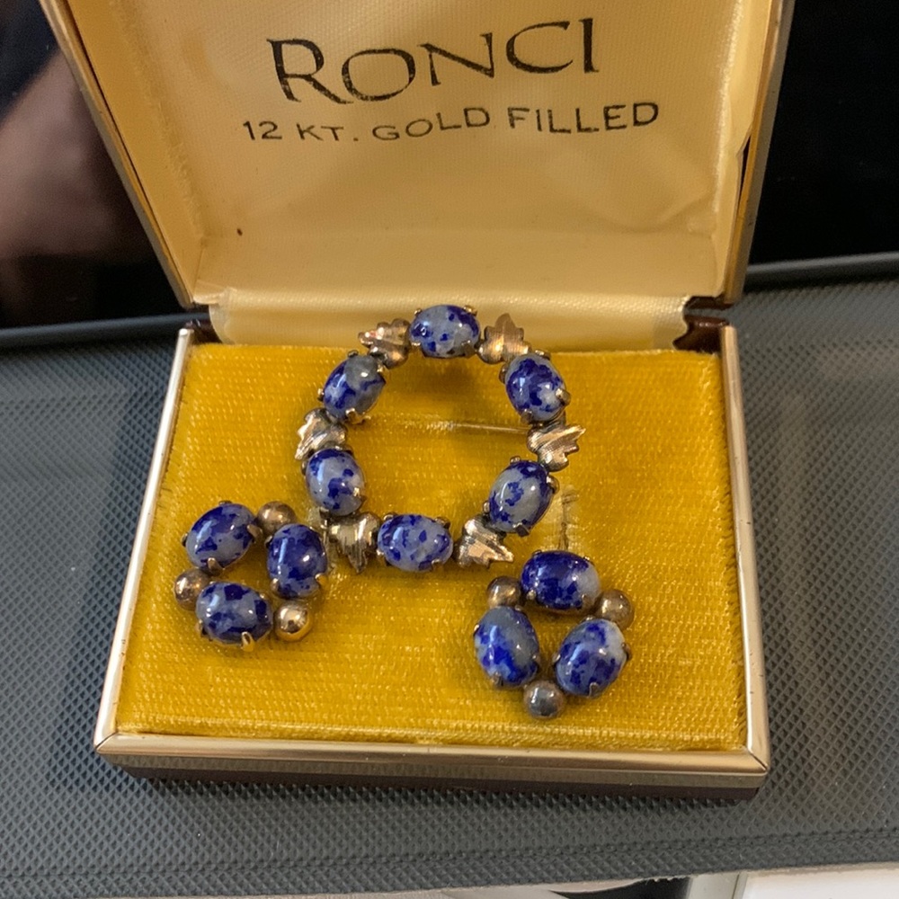 Antique brooch and dangle earring set done in a blue stone and 12 karat gold fil